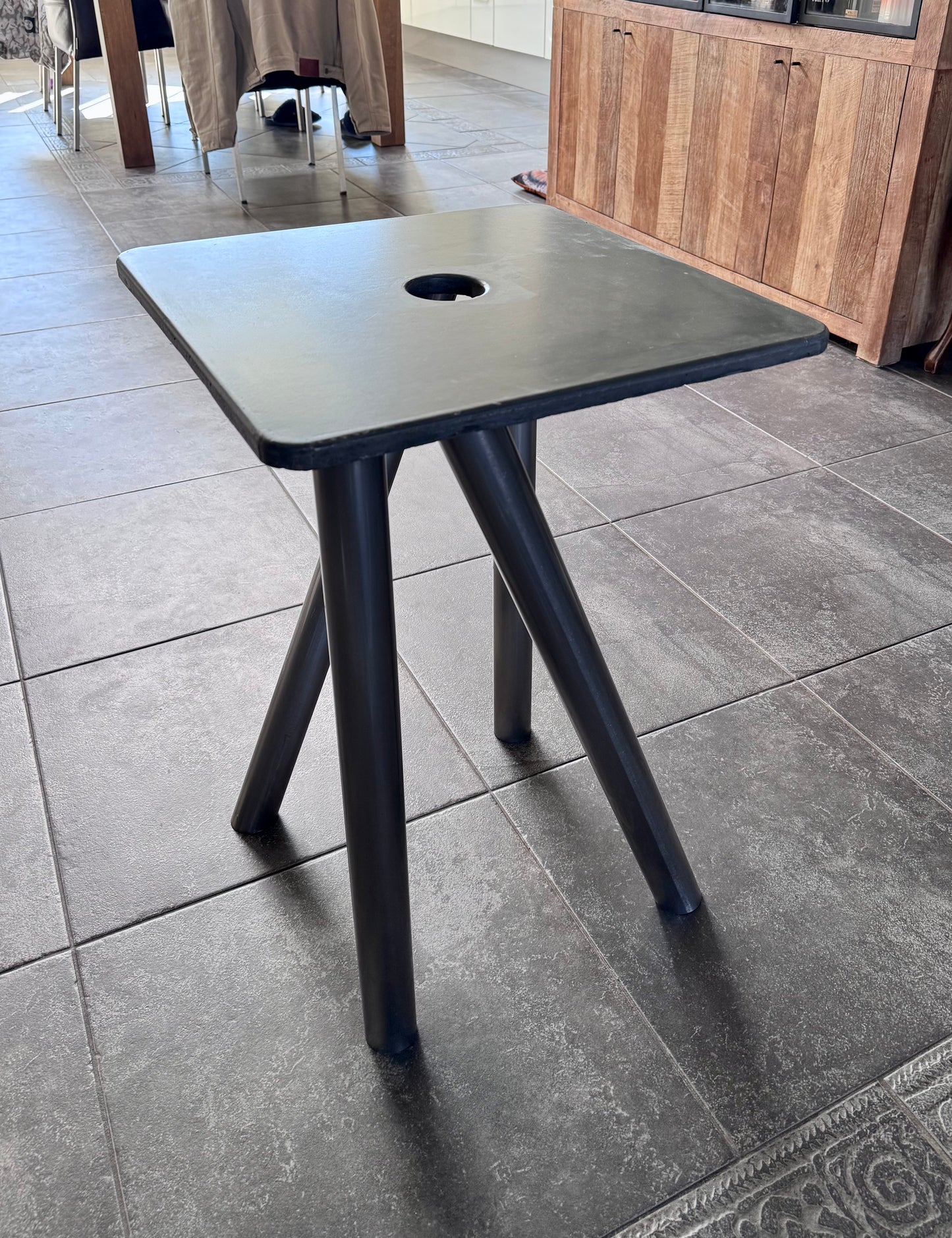 concrete and stainless steel bedside table