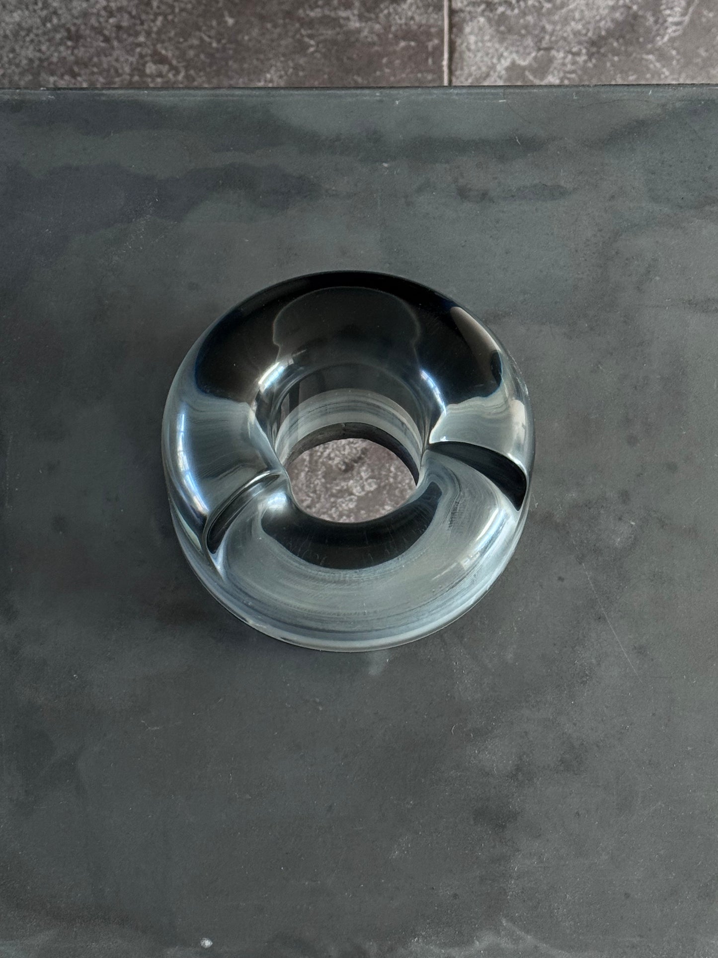 concrete and stainless steel bedside table