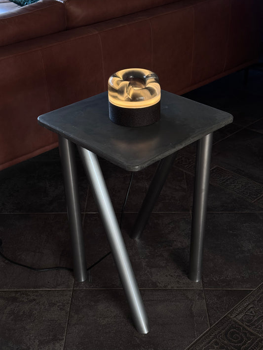 concrete and stainless steel bedside table