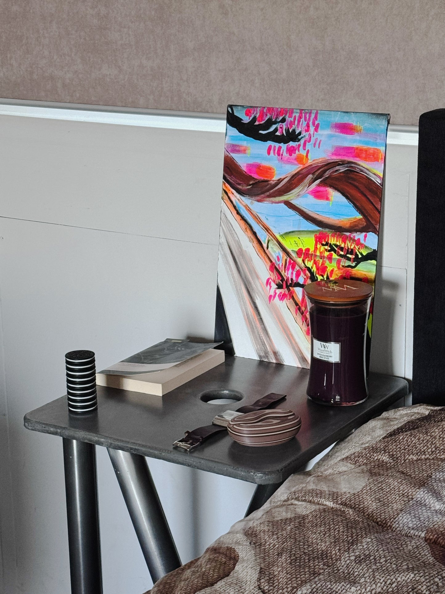 concrete and stainless steel bedside table